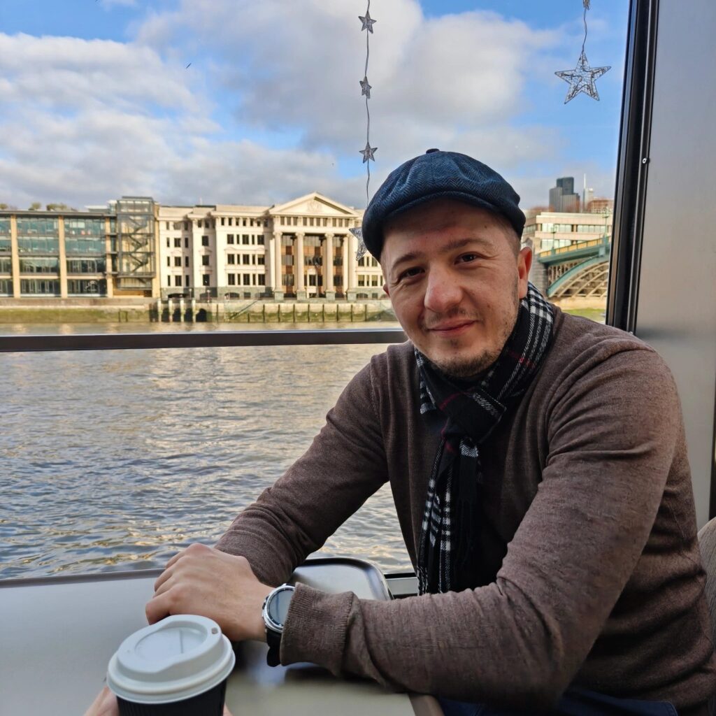 Nenad on a boat on the Thames, London